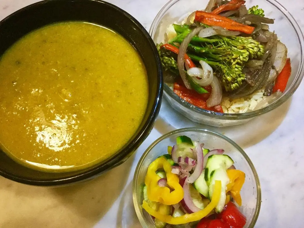 Veggie dishes with soup, salad, and cooked broccoli