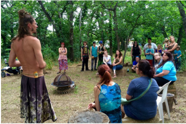 Quinn Eaker speaking at festival